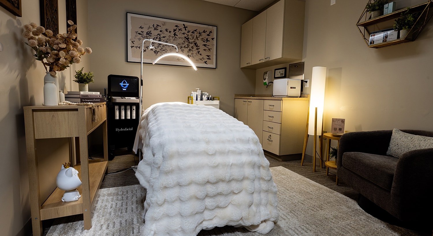 Spa treatment room with relaxation features and amenities.