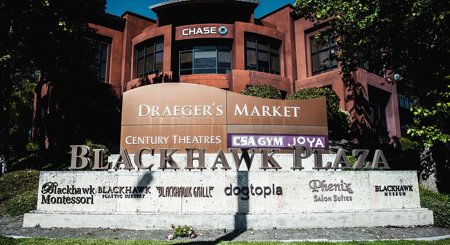 Blackhawk Plaza businesses and attractions sign.