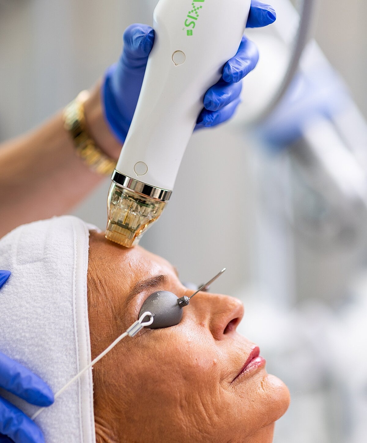 Skincare treatment with a microneedling device.