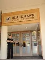 Blackhawk Plastic Surgery entrance with staff member.