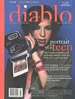 Magazine cover featuring a teen with camera.