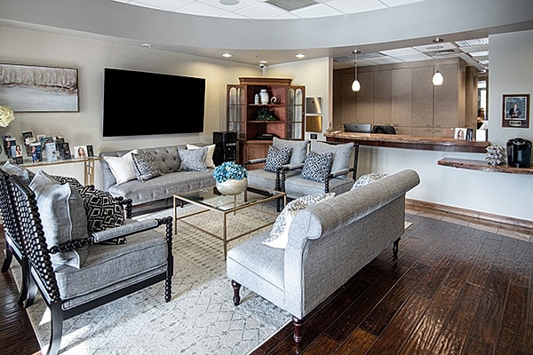Blackhawk Plastic Surgery reception and consultation lounge with modern seating