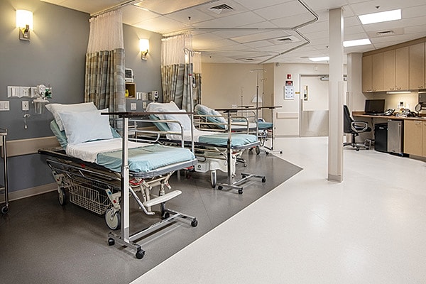 Blackhawk Surgery Center treatment room with medical bed and sterile equipment